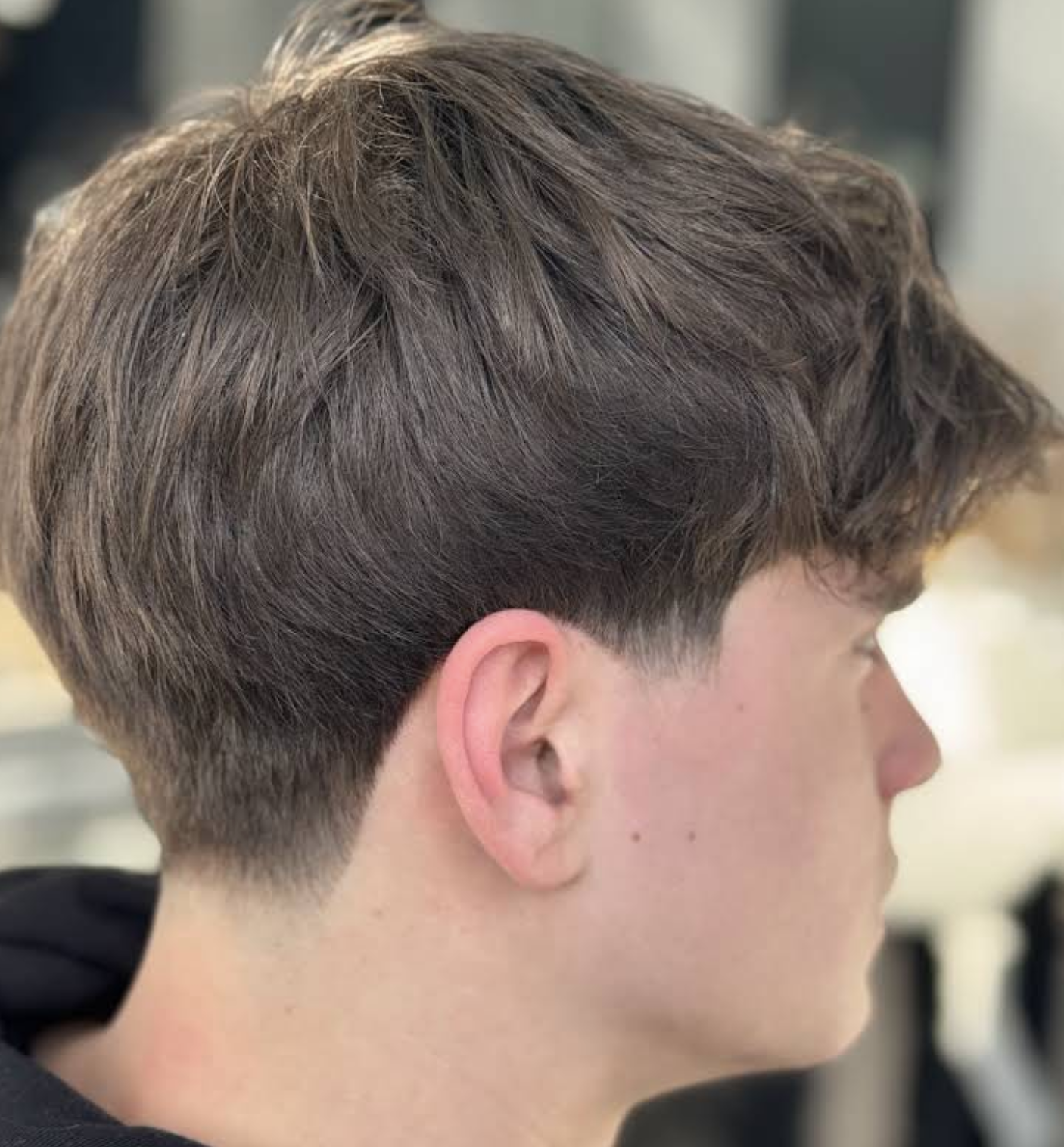 Textured crop with a low taper at the back